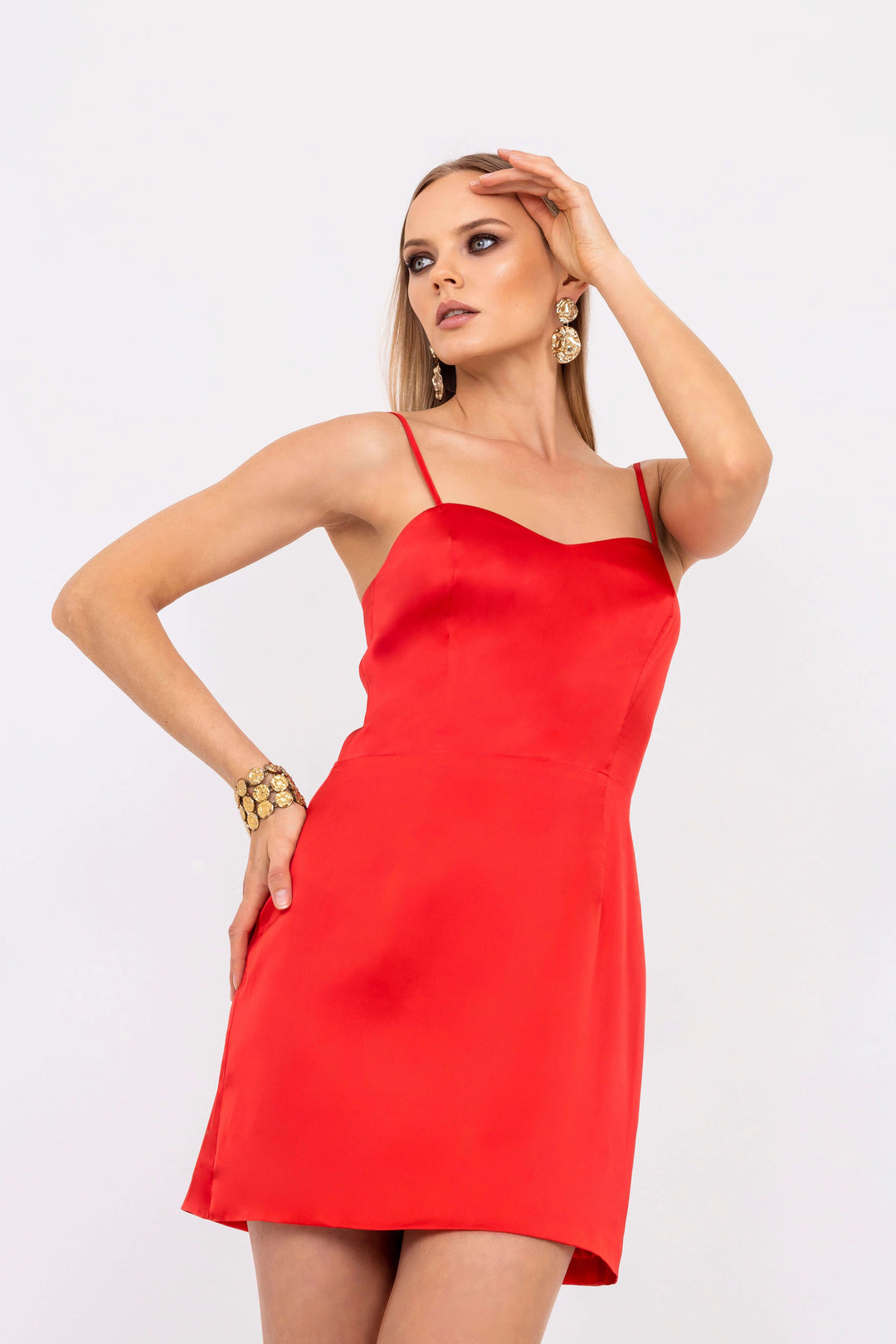 Leochèle Gohar Red Satin Mini Dress- model posing in red satin mini dress