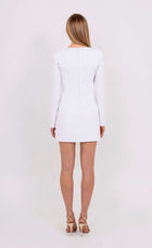 Back view of the Michèle white mini dress by Leochèle, fitted silhouette
