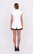 Back view of the Roza white sleeveless blazer with belt by Leochèle